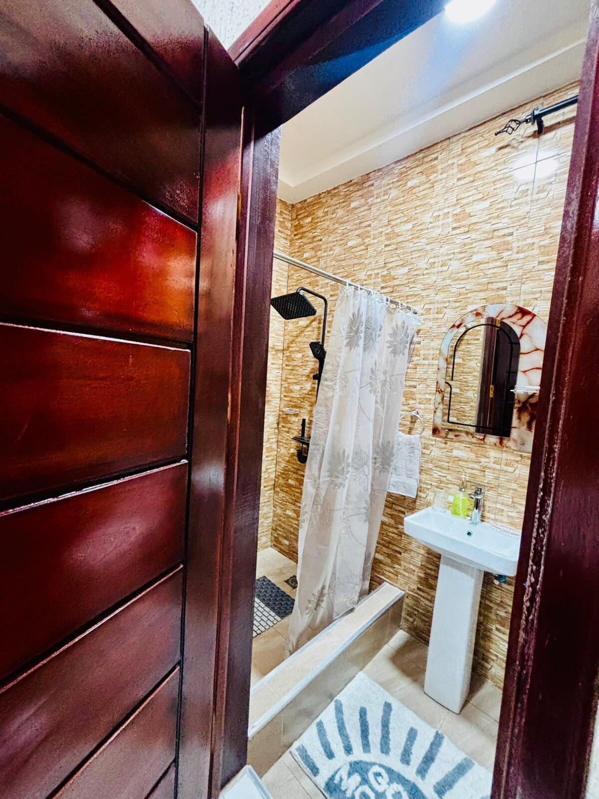 Bathroom 1– Cape Coast Airbnb property managed by Gold Lion International