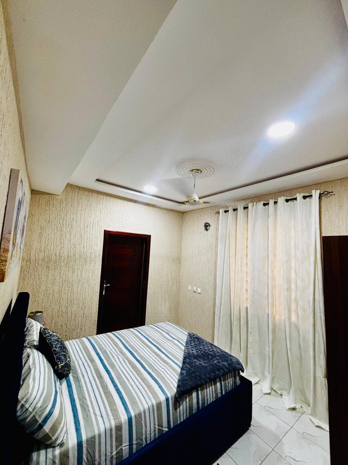 Bedroom 1 of Cape Coast Airbnb property managed by Gold Lion International